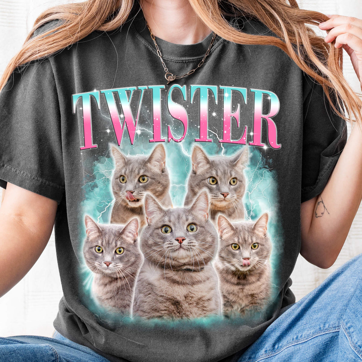 Person wearing a black t-shirt with 'TWISTER' and cat graphics.
